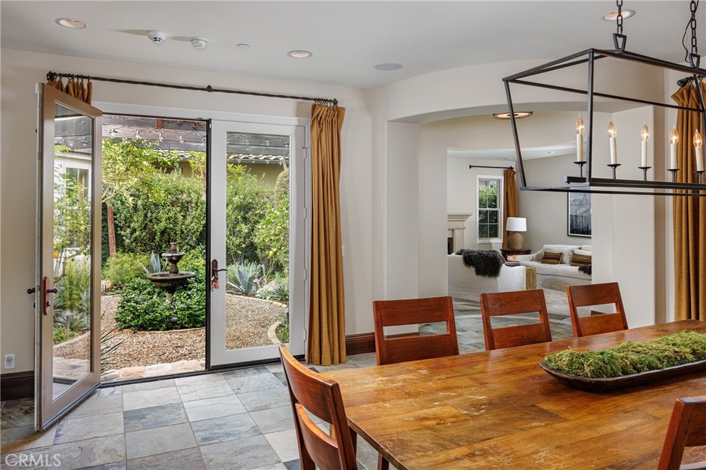 French Doors from the dining room open to a lovely center courtyard with fountain - 18 Via Alcamo, San Clemente CA 92673 - photo 8