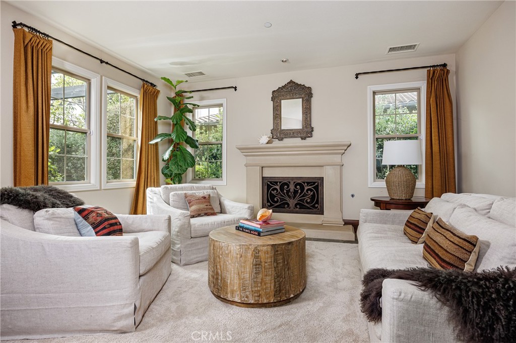 With its own fireplace, the living room provides a special place to relax or entertain - 18 Via Alcamo, San Clemente CA 92673 - photo 10