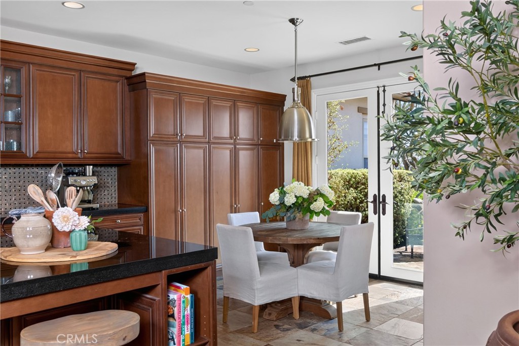 Breakfast nook leads to backyard and loggia to the right - 18 Via Alcamo, San Clemente CA 92673 - photo 11