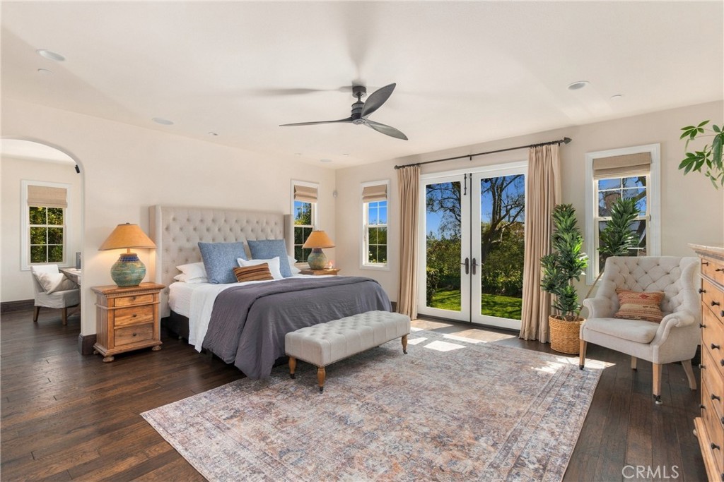 The main-floor primary bedroom is a luxurious place to relax - 18 Via Alcamo, San Clemente CA 92673 - photo 12