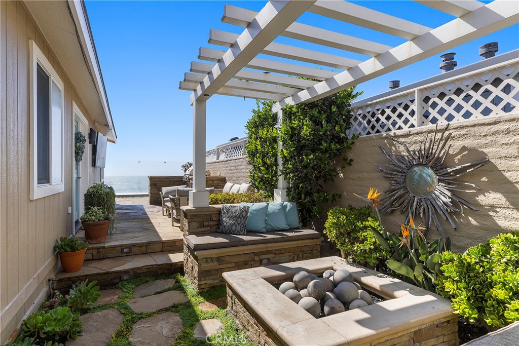 Private side patio with fire pit - 1880 N El Camino Real #14, San Clemente CA 92672 - photo 4