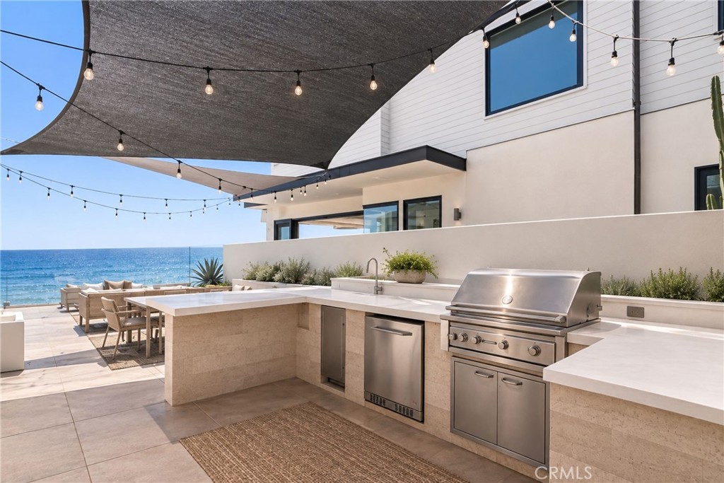 Rendered wall behind the BBQ - 1880 N El Camino Real 74, San Clemente CA 92672 - photo 2