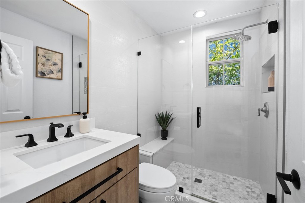 Main level bathroom remodeled in 2023. - 19 Calle Verdadero, San Clemente CA 92673 - photo 8
