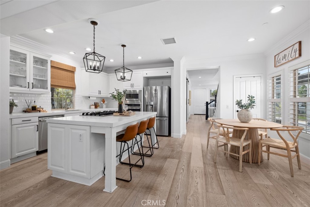 Eating area and bar seating enhance this kitchen. - 19 Calle Verdadero, San Clemente CA 92673 - photo 16