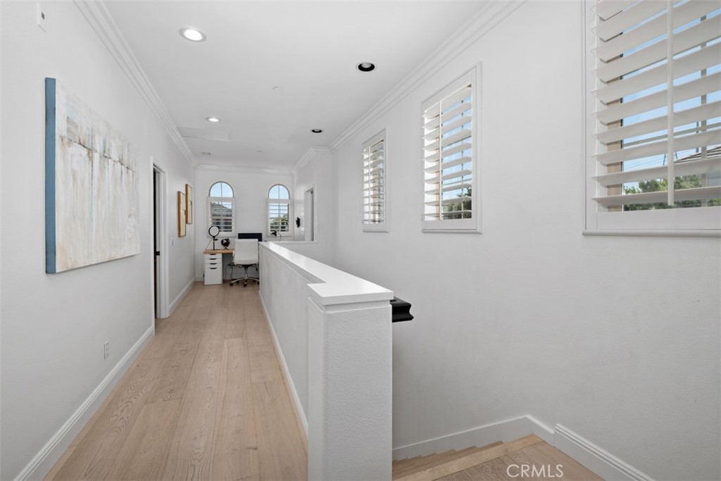 Upstairs hallway with plenty of windows bringing in natural light. - 19 Calle Verdadero, San Clemente CA 92673 - photo 22