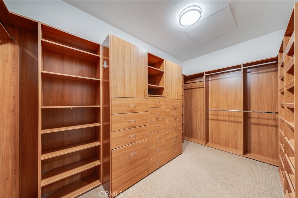 Primary closet has custom built ins - 2 Avenida Cristal, San Clemente CA 92673 - photo 18