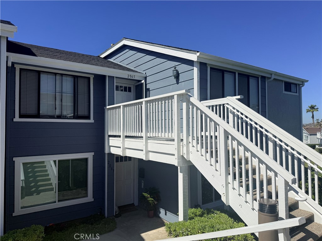 Upper unit with superb views of ocean, sunsets, city lights. San Clementes premier location for views and beach close li - 2065 Via Concha, San Clemente CA 92673 - photo 1