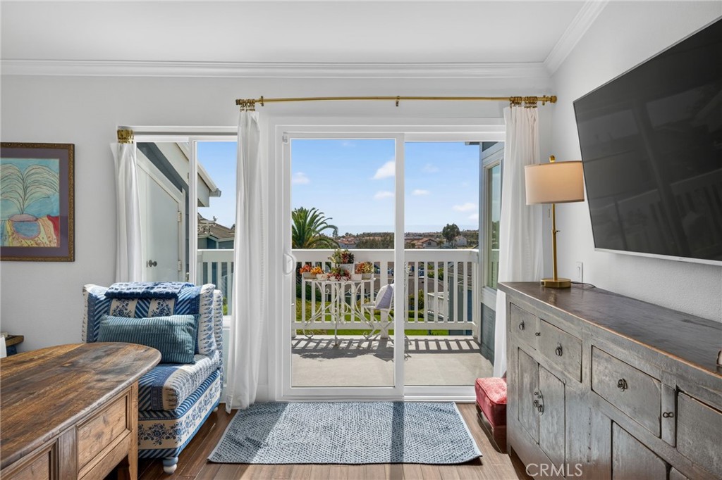 Living room looking to ocean view - 2127 Avenida Espada 210, San Clemente CA 92673 - photo 3