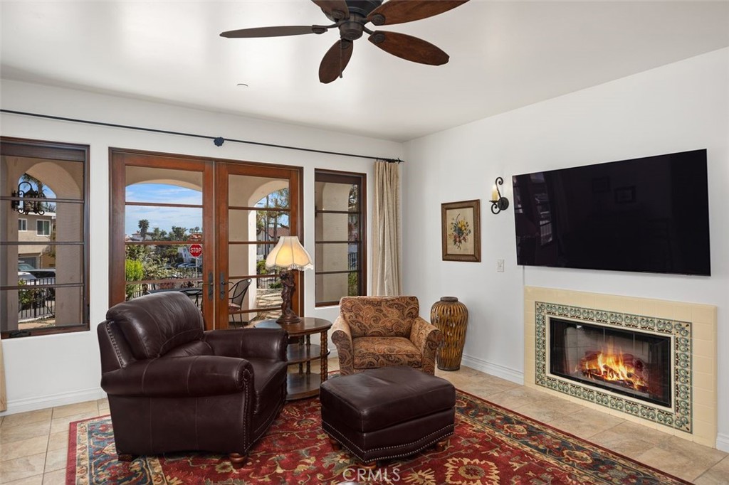 Living area looking out to private 800 sq. foot patio. - 240 Avenida Rosa B, San Clemente CA 92672 - photo 7