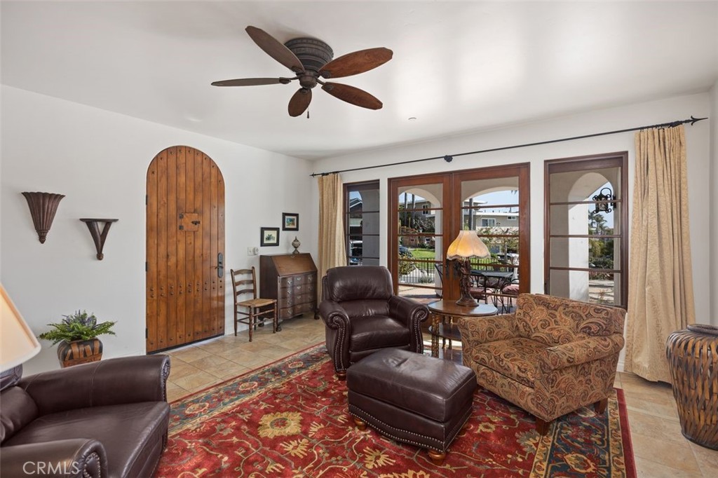 Living area looking out to private 800 sq. foot patio. - 240 Avenida Rosa B, San Clemente CA 92672 - photo 8