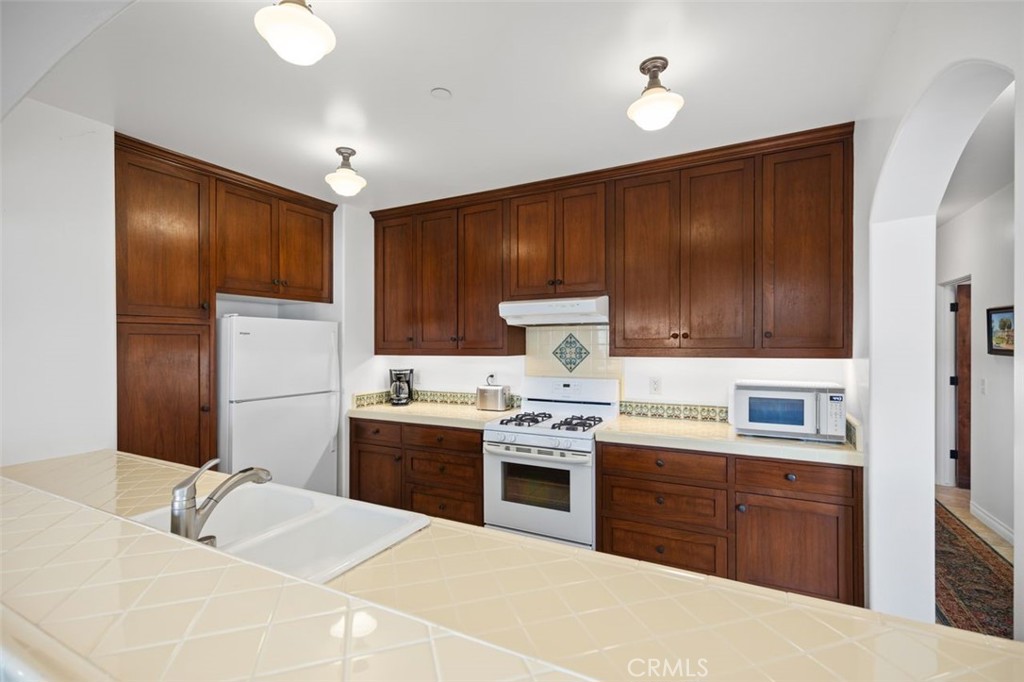 Kitchen with beautiful Spanish tiles. - 240 Avenida Rosa B, San Clemente CA 92672 - photo 16