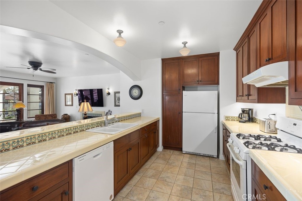 Kitchen with beautiful Spanish tiles. - 240 Avenida Rosa B, San Clemente CA 92672 - photo 17