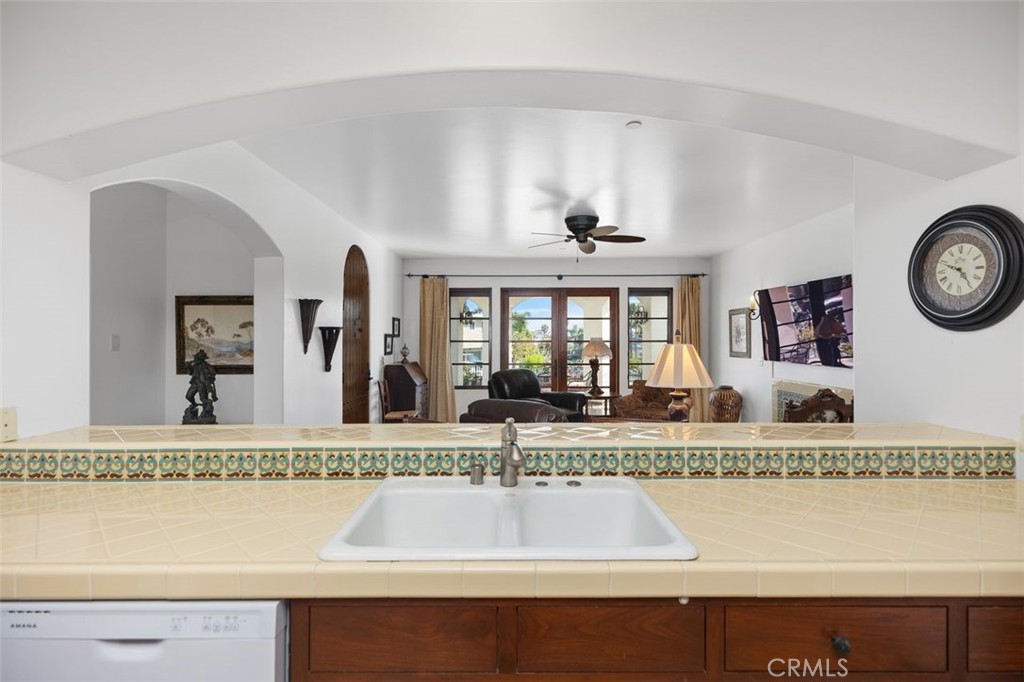 Kitchen looking out towards living area and private patio. - 240 Avenida Rosa B, San Clemente CA 92672 - photo 19