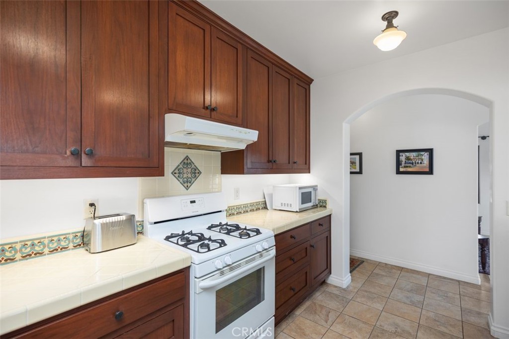 Kitchen looking towards hallway leading to bedroom and bathroom. - 240 Avenida Rosa B, San Clemente CA 92672 - photo 20