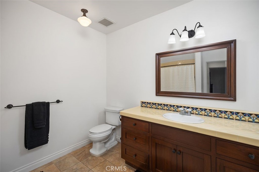Updated bathroom with Spanish tiles. - 240 Avenida Rosa B, San Clemente CA 92672 - photo 24