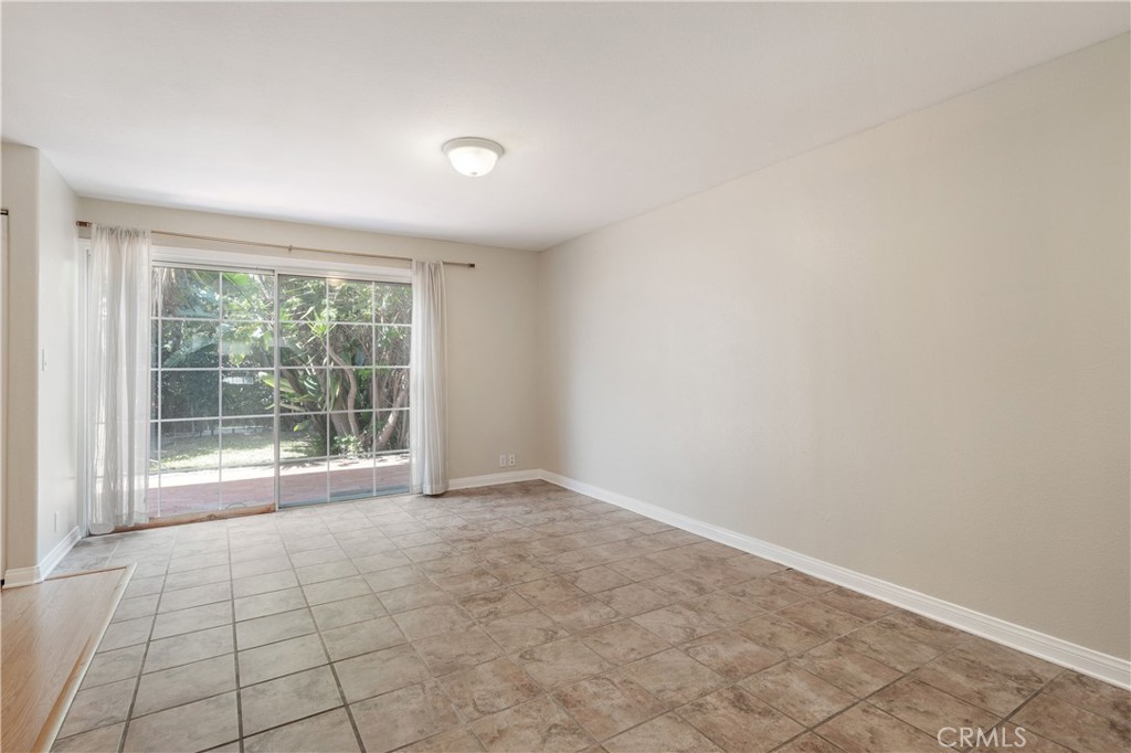 Sliding door leading to front yard - 2707 S El Camino Real, San Clemente CA 92672 - photo 13