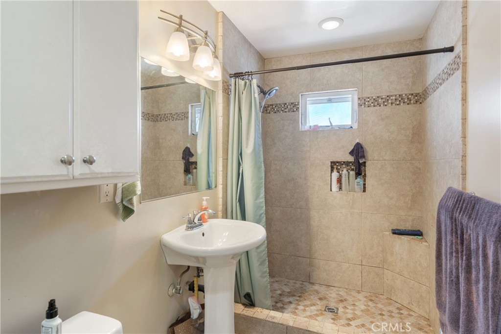 Upstairs bathroom with upgraded tiles - 2707 S El Camino Real, San Clemente CA 92672 - photo 20