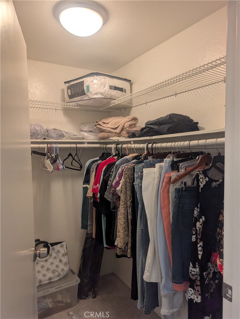 Walk-in closet (1 of 2 closets) - 2914 Camino Capistrano, San Clemente CA 92672 - photo 13