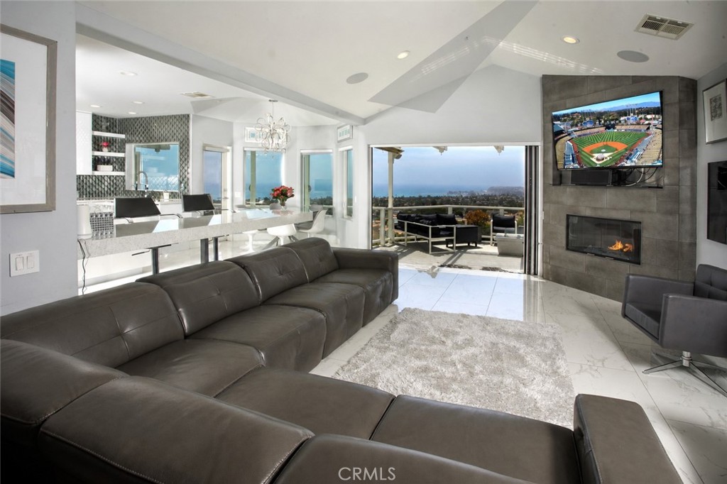 An exceptional entertaining space where the kitchen, family room, and terrace flow together against a backdrop of ocean - 3 Via Pasa, San Clemente CA 92673 - photo 11