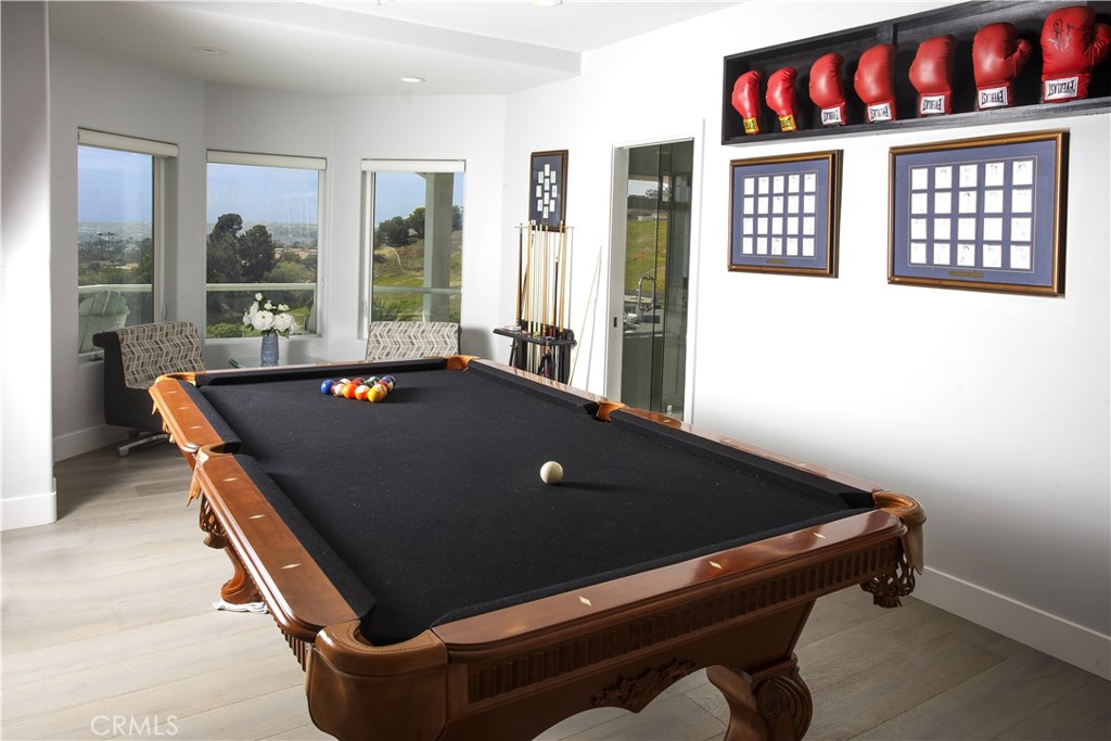Thoughtfully designed as a versatile recreation space, it easily adapts to a media lounge, fitness studio, or hobby room - 3 Via Pasa, San Clemente CA 92673 - photo 21