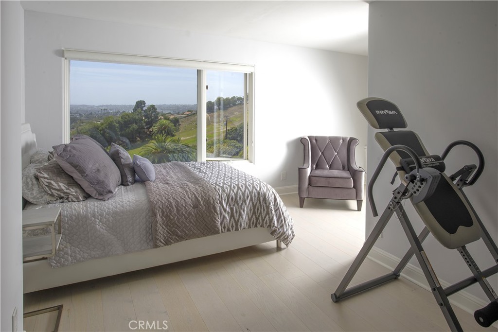 Designed for versatility, this spacious guest bedroom comfortably accommodates overnight visitors while offering room fo - 3 Via Pasa, San Clemente CA 92673 - photo 24