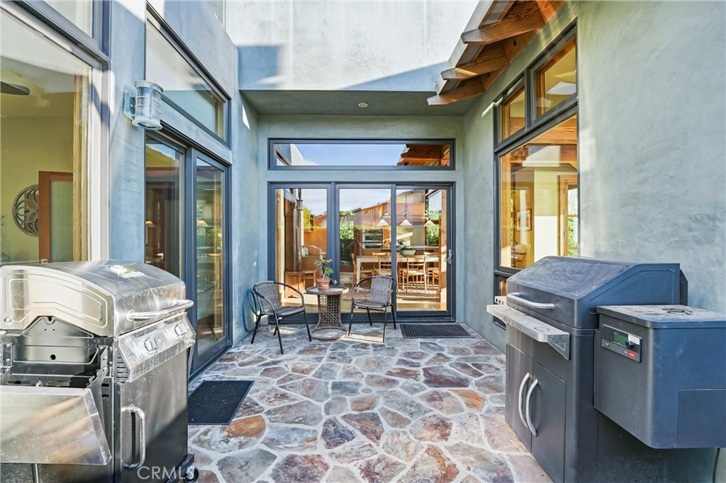 Patio off Kitchen. Guest bedroom on left, living room on right. - 329 Boca Del Canon, San Clemente CA 92672 - photo 16