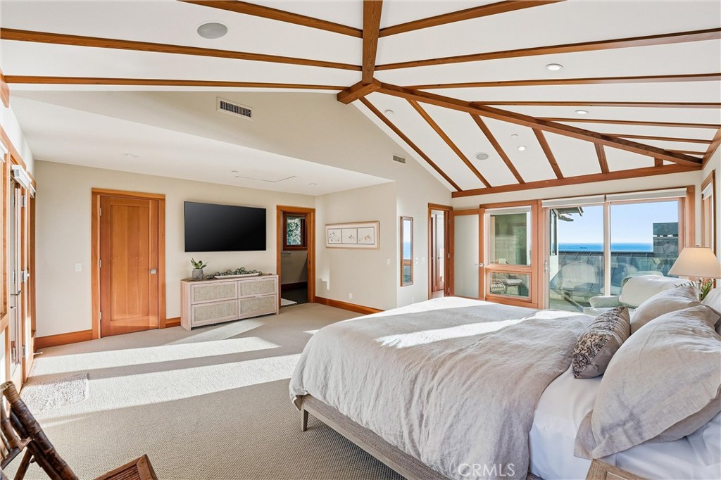 Primary Bedroom with ocean view balcony, and deck with staircase that leads to backyard with jacuzzi. - 329 Boca Del Canon, San Clemente CA 92672 - photo 29