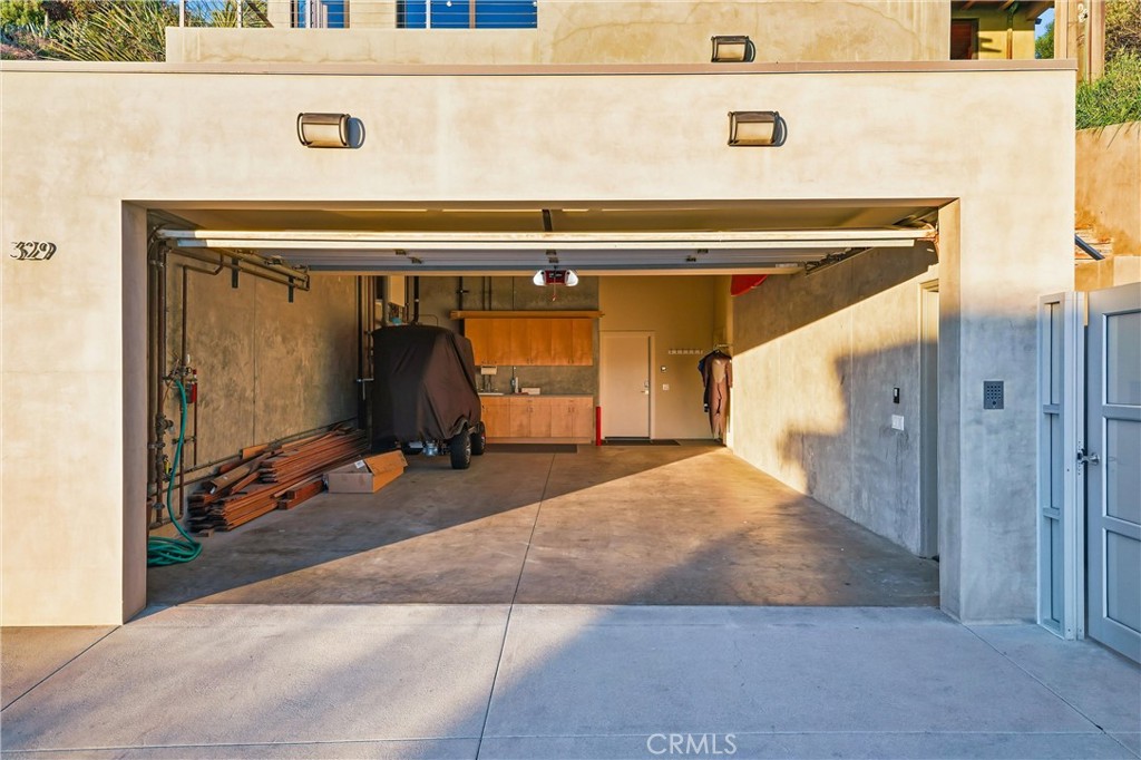 Oversize garage for cars. Tenant Closet is filled with wetsuits, surfboards, bodyboards, beach chairs, umbrella, etc. (G - 329 Boca Del Canon, San Clemente CA 92672 - photo 44