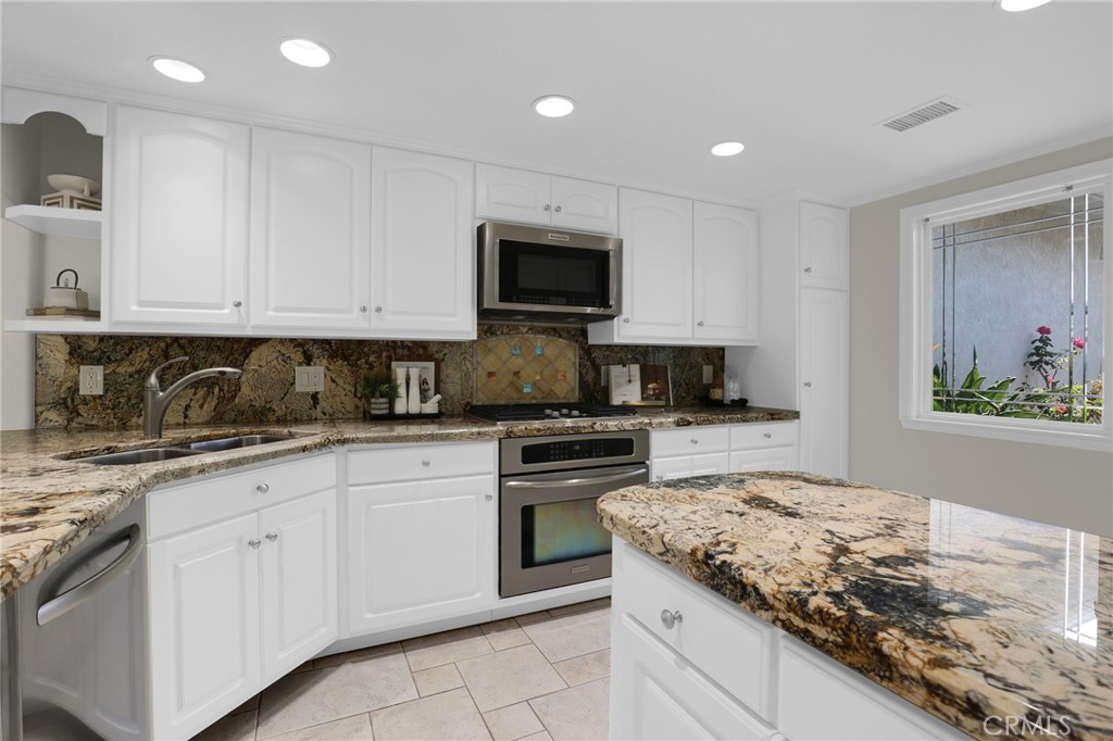 Expansive storage in the updated kitchen - 3396 Paseo Halcon, San Clemente CA 92672 - photo 7