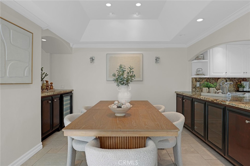 Custom built ins in the dining room feature a wine refrigertor - 3396 Paseo Halcon, San Clemente CA 92672 - photo 13