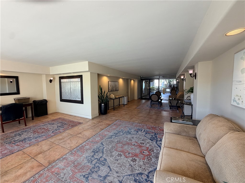 Community lobby, sitting area, mailboxes and deliveries. - 405 Avenida Granada 404, San Clemente CA 92672 - photo 16