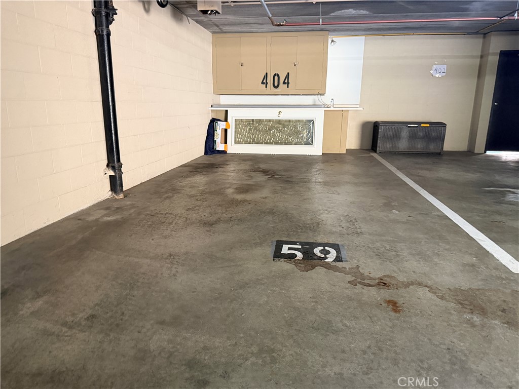 Assigned parking spot and storage cabinets. - 405 Avenida Granada 404, San Clemente CA 92672 - photo 17