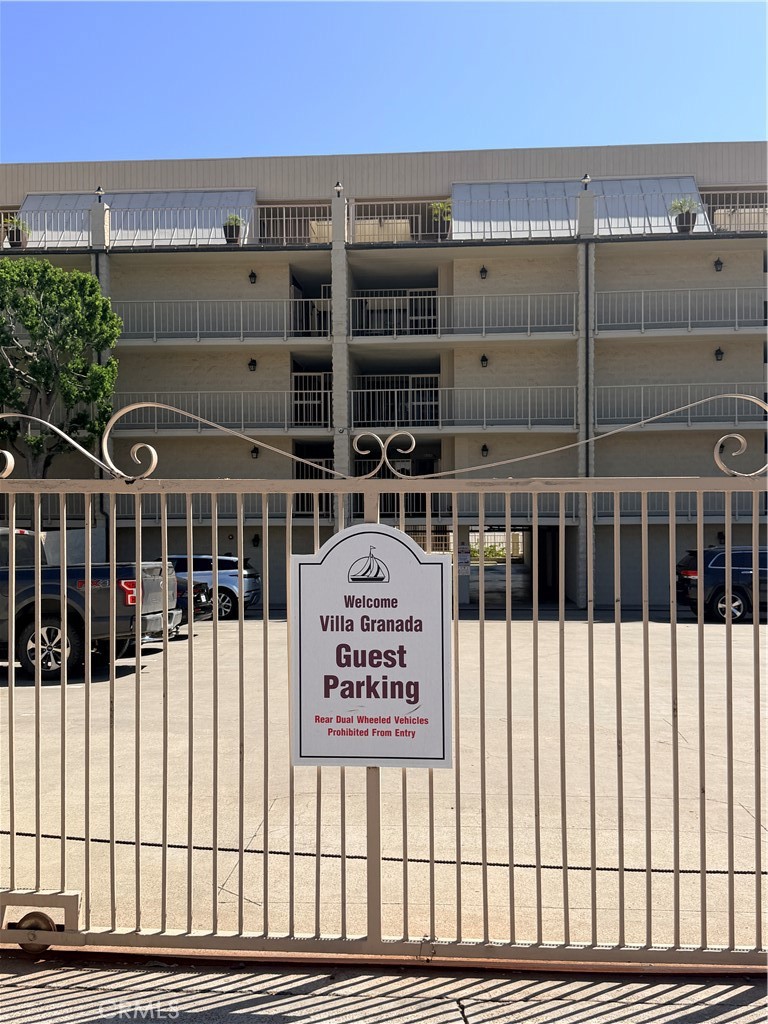 Gated entrance to assinged parking​​‌​​​​‌​​‌‌​​‌‌​​‌‌​​‌​​​‌‌​‌​​​​‌‌​‌​​ spot. - 405 Avenida Granada 404, San Clemente CA 92672 - photo 22