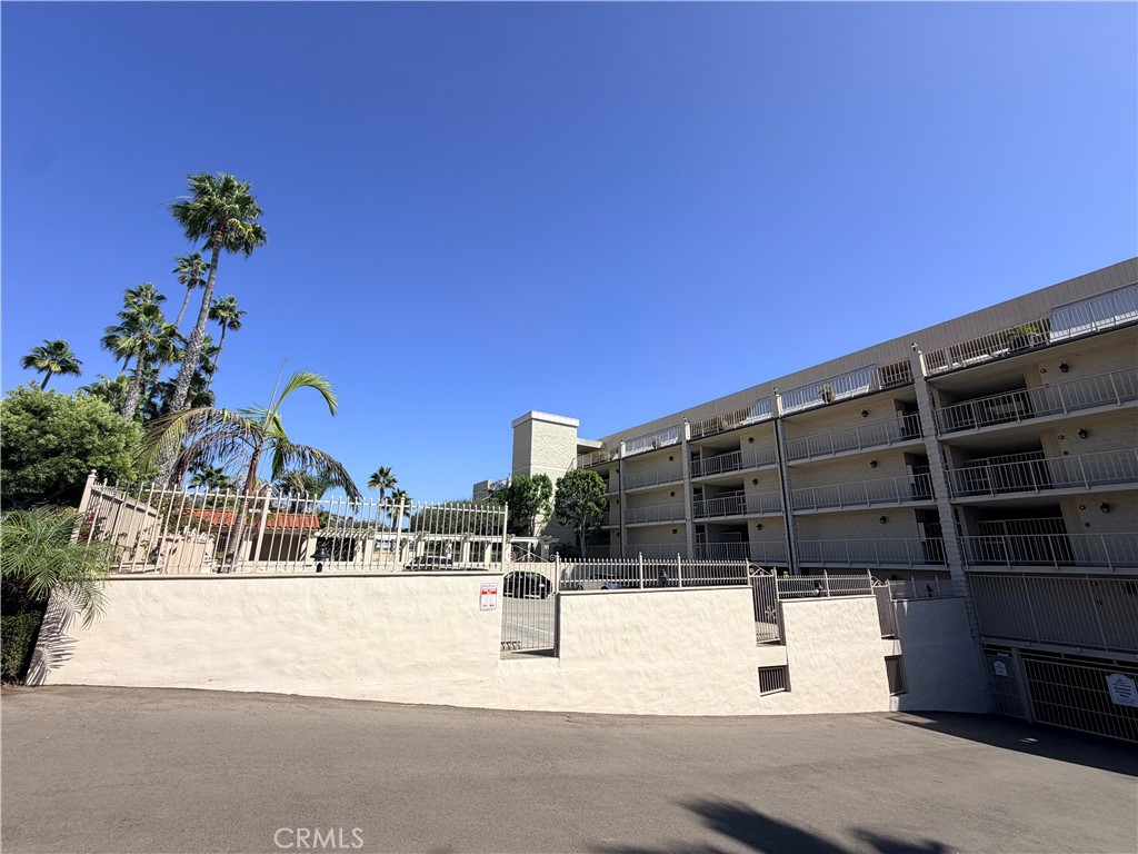Taken from near community trash dumpster / guest parking area. - 405 Avenida Granada 404, San Clemente CA 92672 - photo 23