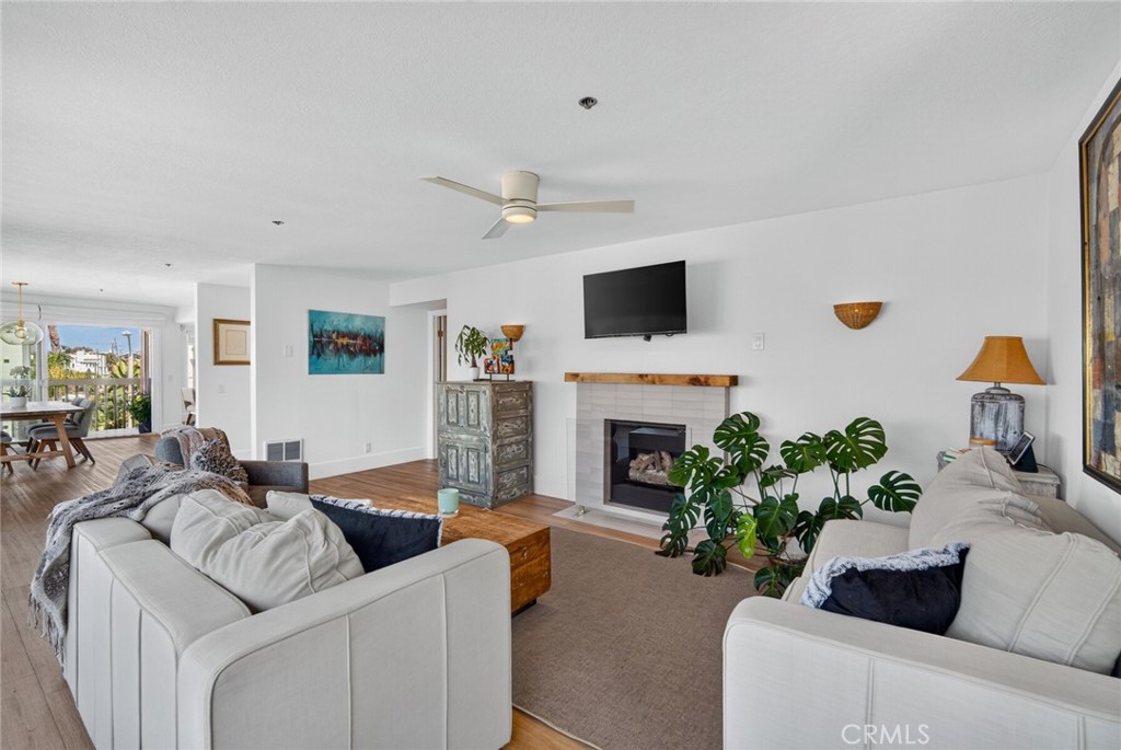 Tiled fireplace - 409 Arenoso 2, San Clemente CA 92672 - photo 3