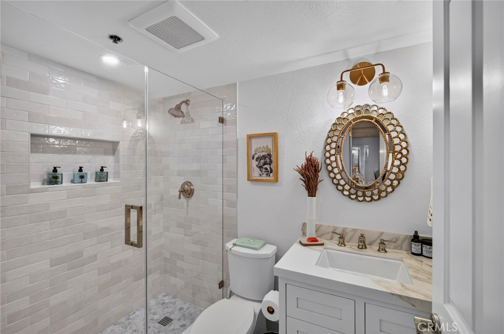 The second bathroom with walk-in glass shower - 409 Arenoso 2, San Clemente CA 92672 - photo 35