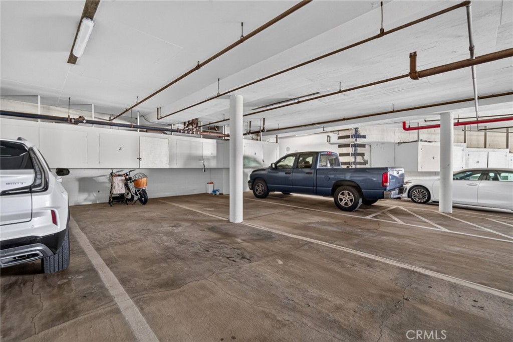 The unit comes with two tandem parking spots and storage space as pictured. - 409 Arenoso 2, San Clemente CA 92672 - photo 51
