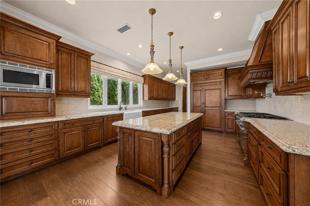 Chef's Kitchen with Oversized Center Island - 41 Marbella, San Clemente CA 92673 - photo 14