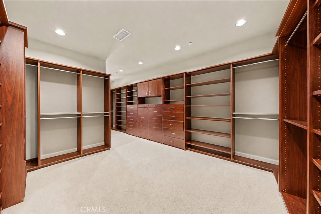 Oversized Primary Walk-In Closet with Custom Built-Ins - 41 Marbella, San Clemente CA 92673 - photo 29