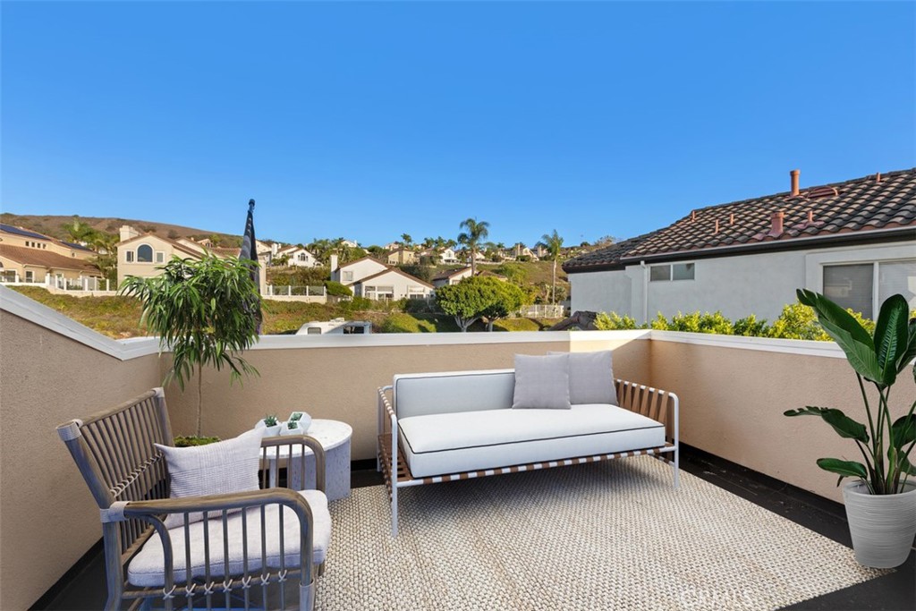 Large Deck Off Bedroom Virtually Staged Image - 48 Santa Clara, San Clemente CA 92672 - photo 25