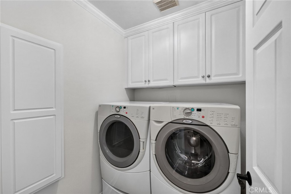 Downstairs Laundry Room w/built in ironing board - 50 Paseo Verde, San Clemente CA 92673 - photo 15