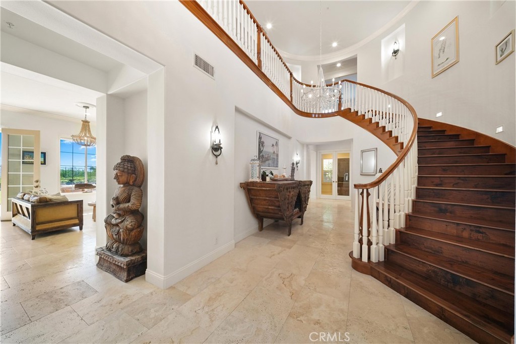 A grand two-story entry welcomes you with soaring ceilings and an impressive sense of light and space. - 6614 Colina Puesta, San Clemente CA 92673 - photo 8