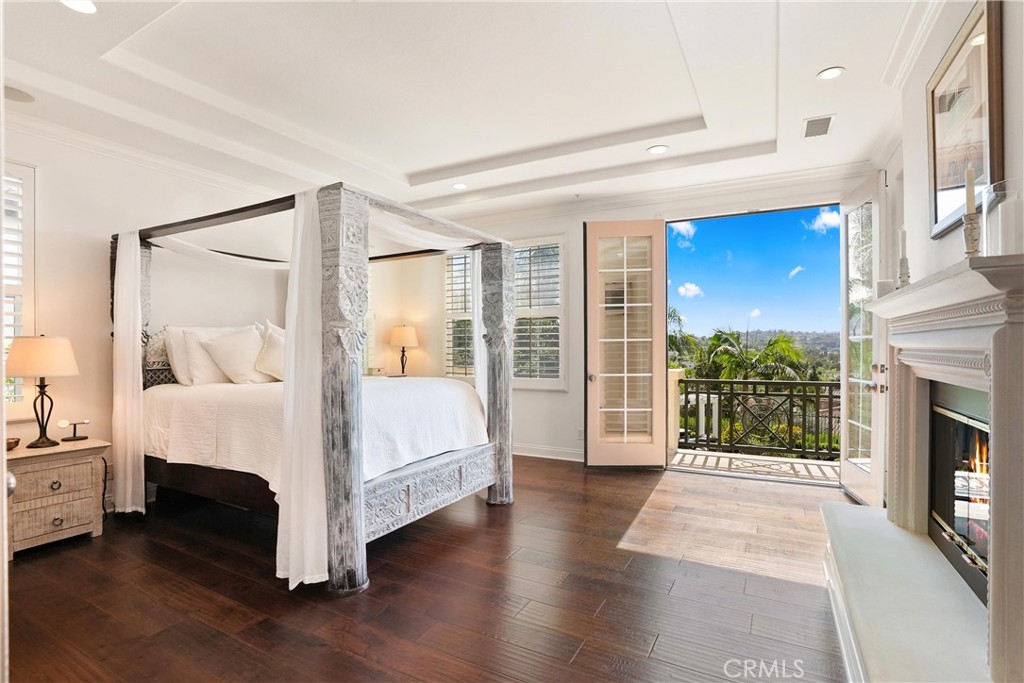 Expansive primary bedroom with spacious retreat offers a peaceful escape, with room to unwind, read, or enjoy a quiet mo - 6614 Colina Puesta, San Clemente CA 92673 - photo 23