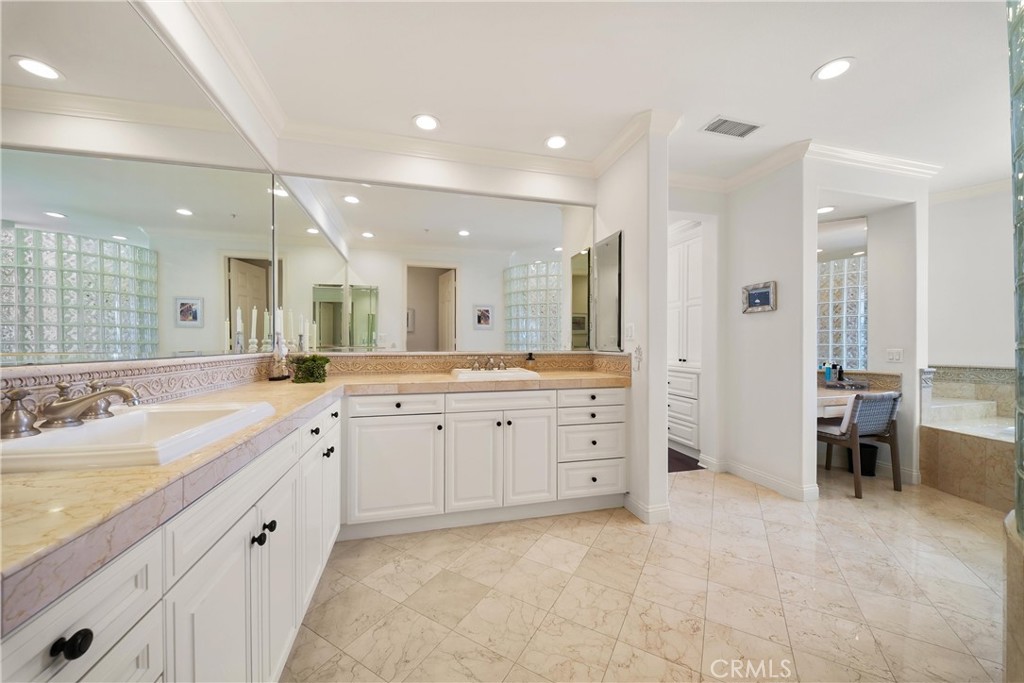 Exceptionally spacious primary bathroom offers a luxurious retreat with an impressive sense of openness and room to unwi - 6614 Colina Puesta, San Clemente CA 92673 - photo 27