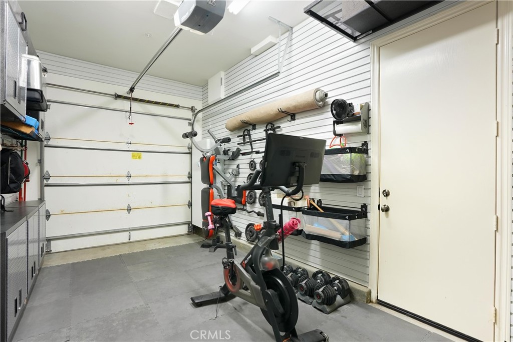Spacious four-car garage offers exceptional versatility, with room for vehicles, storage, or a home gym. - 6614 Colina Puesta, San Clemente CA 92673 - photo 39