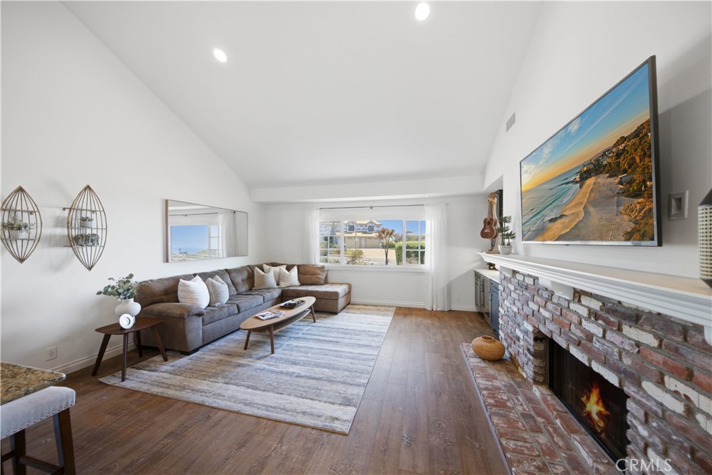 Family Room with Gorgeous Ocean Views and Fireplace. - 880 Avenida Acapulco, San Clemente CA 92672 - photo 27