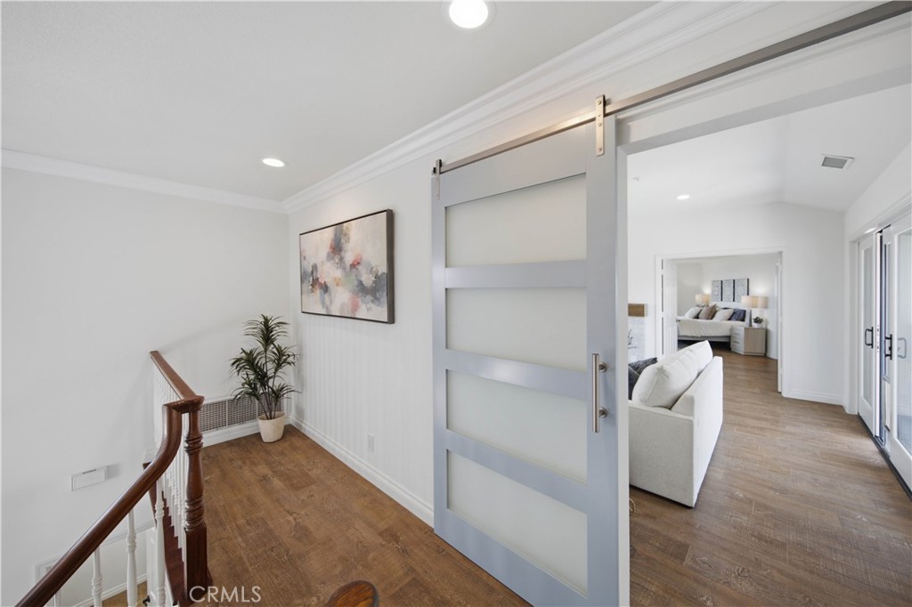Entrance with Barn Door to Upstairs Living Room. - 880 Avenida Acapulco, San Clemente CA 92672 - photo 48