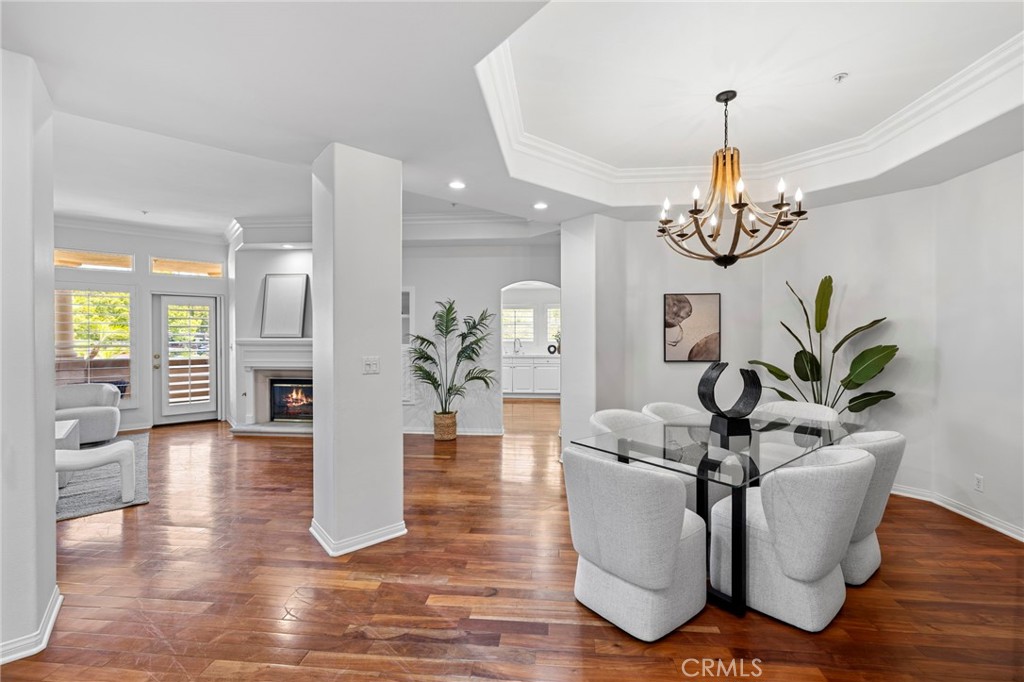 Dining room open to living room - 25 Plaza Caloroso, San Juan Capistrano CA 92675 - photo 1