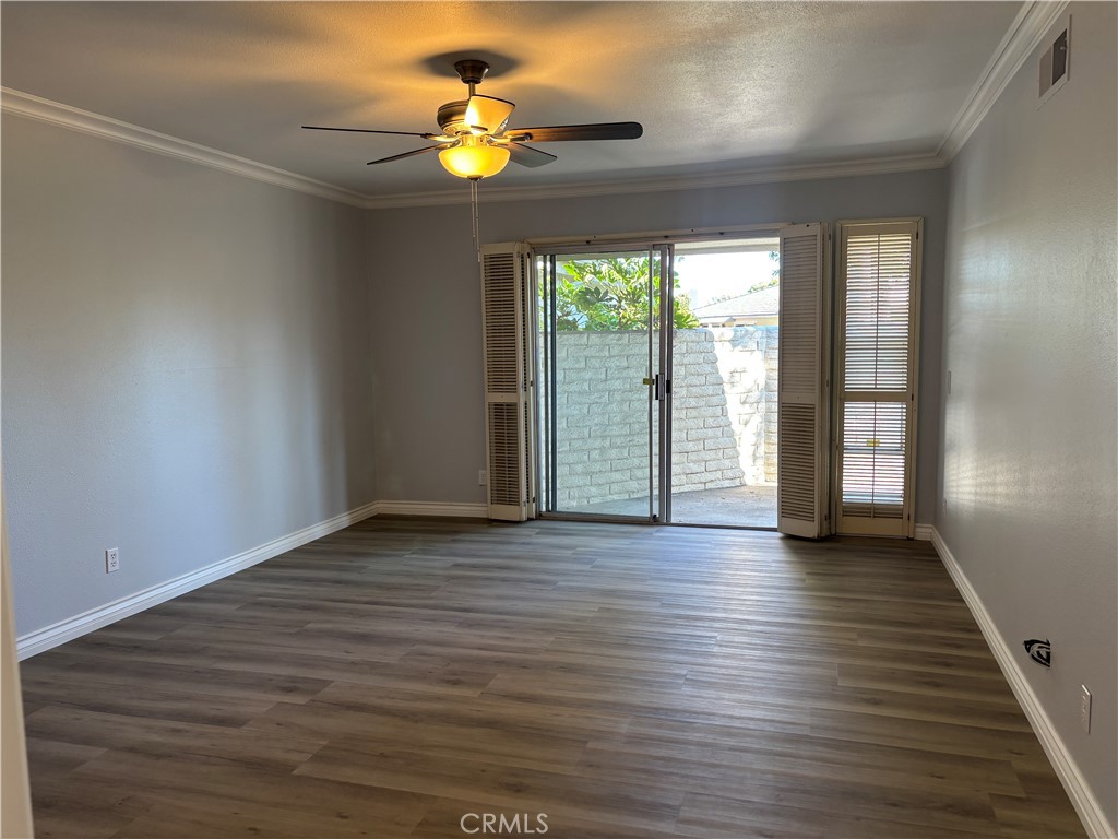 Main bedroom with a private patio - 27111 Capote De Paseo C, San Juan Capistrano CA 92675 - photo 13