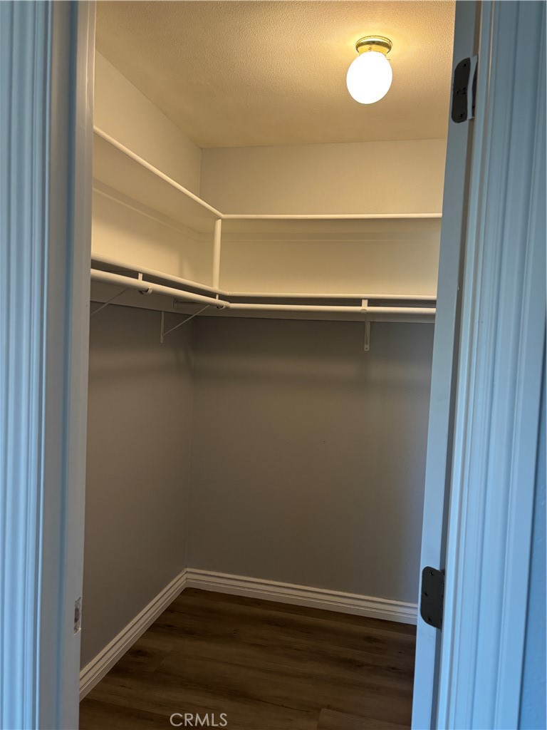 Walk in closet in main bedroom - 27111 Capote De Paseo C, San Juan Capistrano CA 92675 - photo 15